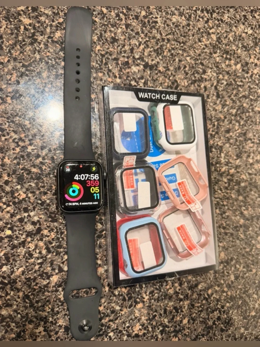 Apple Watch Series 6 40mm with 9 Screen Protective Cases and Charging Cord